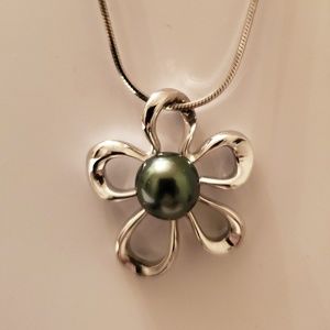 Na Hoku floating plumeria pendant